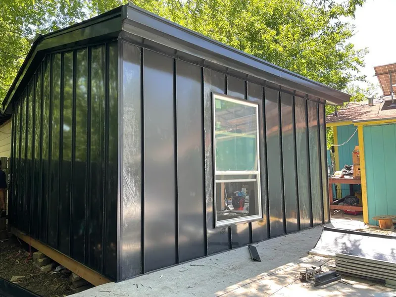 Black standing seam metal wall panels for Metal Roof Installation in Canby