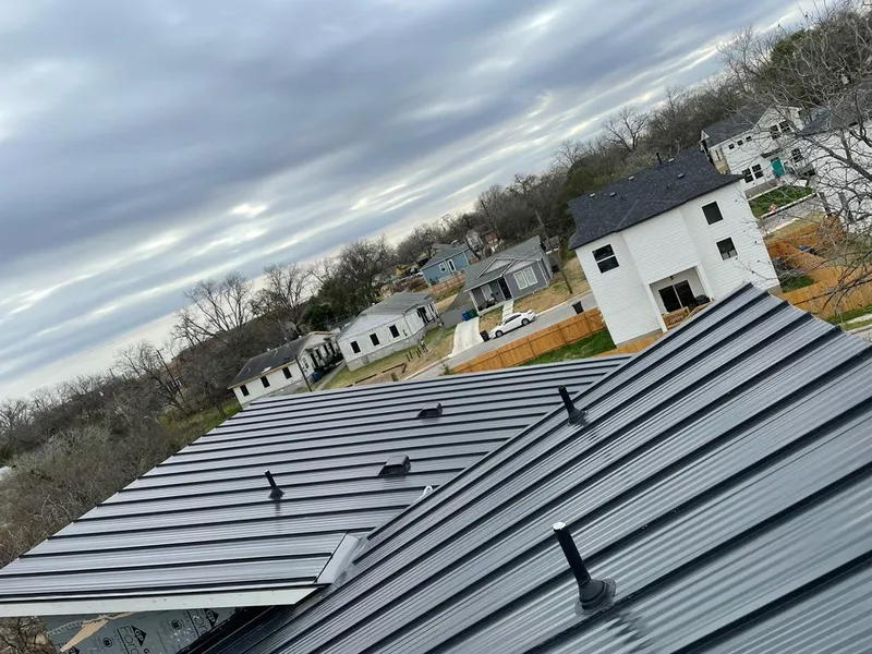 Standing seam metal roof panels with vents for Skylight Repair in Canby